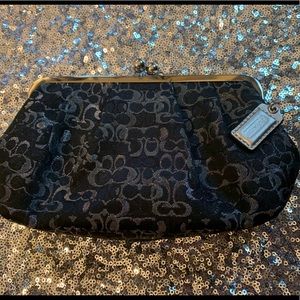Coach black and silver Signature Clutch bag
